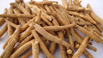 Ashwagandha Dry Root Medicinal Herb with Fresh Leaves, Poison Gooseberry, or Winter Cherry