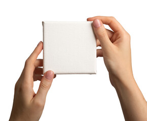Hand holding blank empty white canvas mock up of square shape, isolated on white