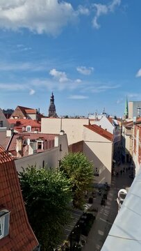 Roofs and spiers of cathedrals in the old city of Riga. Sunny day in the capital of Latvia. Historical center of ancient buildings.