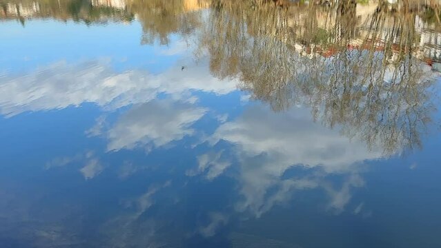 Beautiful reflections in the water of the Tamega River, Amarante, Portugal