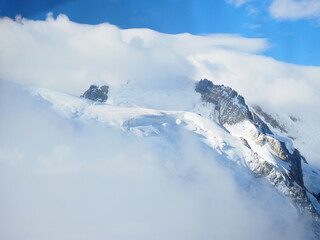 Fototapeta na wymiar Mont Blanc mountain view from piste in Courmayeur ski resort. Italian Alps, Aosta Valley. Monte Bianco in Italy.