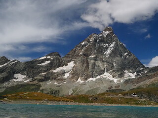 Incredible view of the Matterhorn (Cervino) reflected in the Blue Lake near Breuil-Cervinia, Aosta Valley, Italy