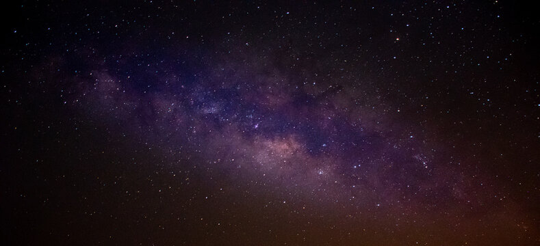 Panorama Milky way star on dark night.Deep sky on Universe. with noise and grain.Photo by long exposure and select white balance. © Aewaew