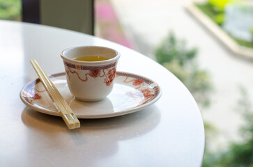 A cup of tea in a traditional Chinese restaurant
