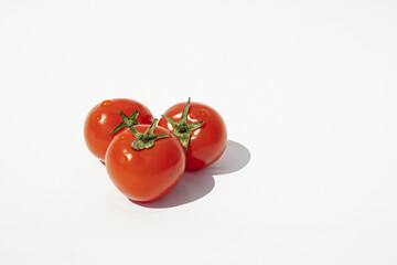 Fresh cherry tomato isolated on white background cutout.