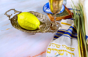 Sukkot, Jewish Orthodox festival, features use of traditional Holiday symbols such as four species...