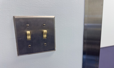 light switch in a dimly lit room, showcasing anticipation, connection, and the power of choice