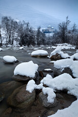 The Noce stream and the medieval castle of Caldes. Sole Valley, Trentino, Italy.