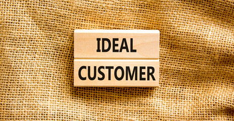 Ideal customer symbol. Concept words Ideal customer on beautiful wooden blocks. Beautiful canvas table canvas background. Business ideal customer concept. Copy space.