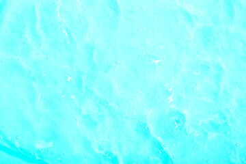 Cosmetic gel, serum transparent sample. Liquid cream with bubble texture. Gel texture of a cosmetic product. Clear liquid lotion for skin care.