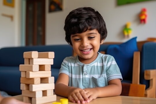 Latin American child having fun playing with wooden blocks