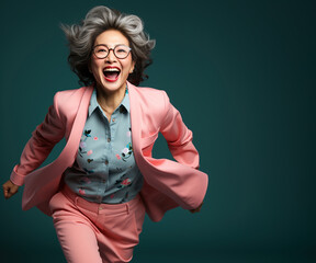 Middle aged woman cheering happily, leadership, boss, president, senior model, fashion concept.