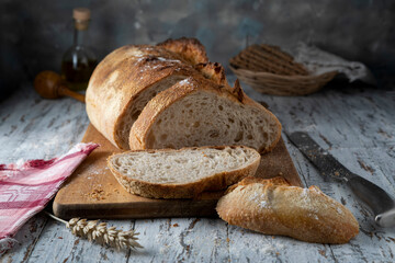 Sliced homemade wheat bread on a rustic table