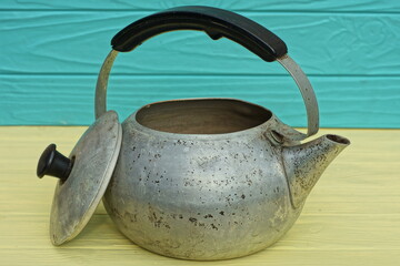 aluminum dirty, old retro classic silver colors traditional home kitchen manual for heating water...