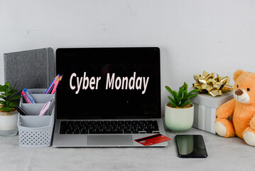 Laptop, money and credit card for purchases on the table. Cyber Monday sale online