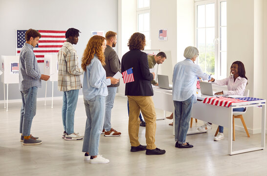 Diverse American citizens vote at presidential elections. Young and mature multiracial multiethnic people standing in line at polling station. Elections, democracy, United States of America concept