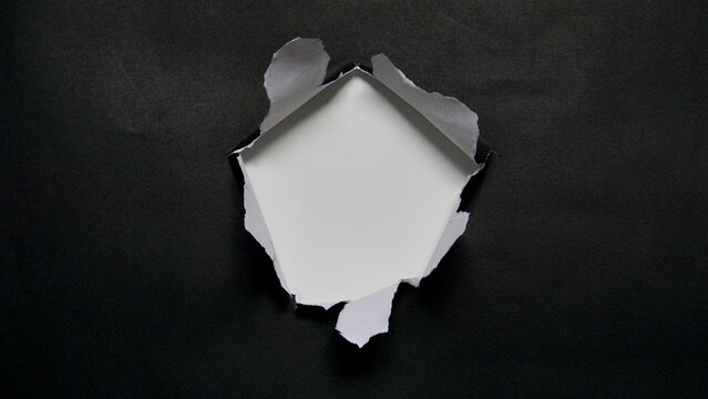 Torn paper. Vector illustration of torn black paper sheet isolated on transparent background - Powered by Adobe