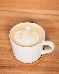 cup of coffee on a wooden table