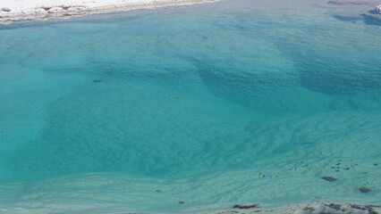 Baltiche hidden lagoon, turquoise salt water in Atacama salt desert Chile