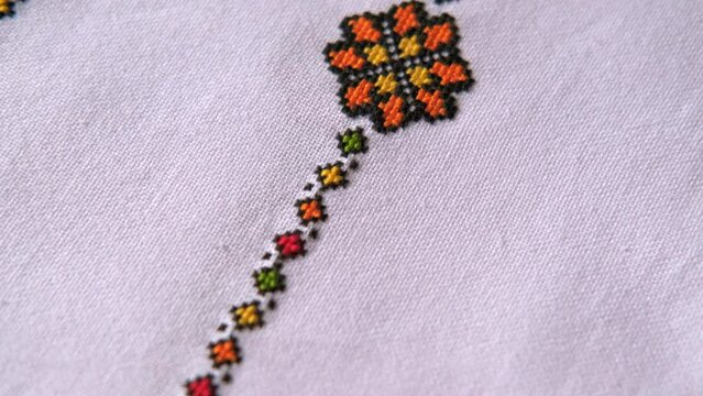 Slavic cross stitch by colored threads. Design of ethnic pattern with Embroidery