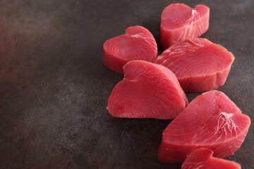 Large chunks of tuna steak. Fresh tuna. Healthy food. Natural omega. Selective focus.Copy space.