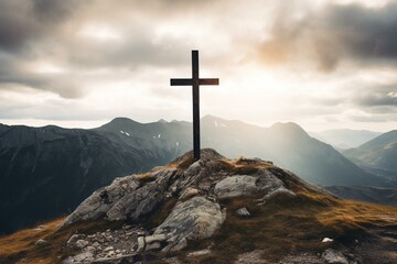 A picture of a religious cross on a hill with a mountain backdrop. Generative AI - obrazy, fototapety, plakaty