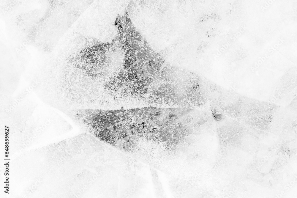 Poster close-up of snow on cracked and thin layers of ice in the winter. simple and minimalistic abstract h
