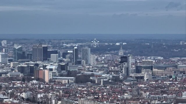 A cloudy panorama from above: Brussels' legacy stands tall amidst its bustling neighborhoods.
