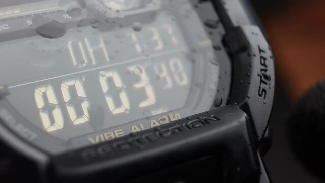 LCD display of a tough sports watch with running timer and stopwatch 