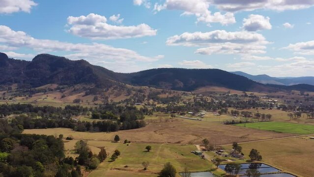 Wide scenic landscape of agriculture vale around Gloucester town in Australia.
