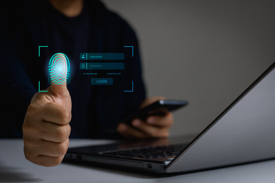 Cyber security concept. Businessman login with fingerprint scanning technology. fingerprint to identify personal. Fingerprint scan provides security access with biometrics identification.