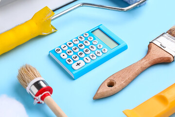 Composition with calculator and painting tools on blue background. Renovation budget concept - obrazy, fototapety, plakaty