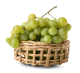 Wicker bowl with sweet green grapes on white background