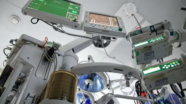 Modern technological machines working in the surgery room. Medical equipment for contemporary surgeries. Low angle view.