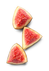 Slices of ripe fresh fig isolated on white background