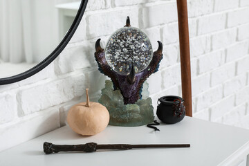 Halloween decor on dressing table in room, closeup