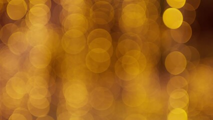 Abstract isolated blurred festive orange lights with bokeh. Holiday concept backdrop with bright shapes, sparkling lights, twinkling.