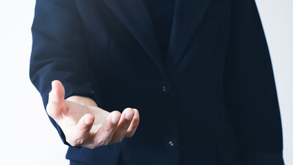 Fototapeta premium Business woman empty hand open on white background. Business and financial concept.