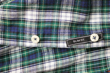  label tag slim fit on a men shirt 