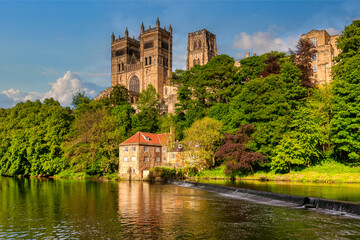 Durham Cathedral and the Old Fulling Mill, on the banks of the River Wear, on a sunny spring day, County Durham, UK