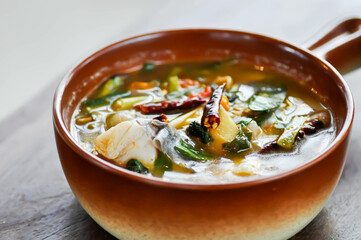 fish soup or spicy soup, spicy fish soup or sea bass soup with vegetable