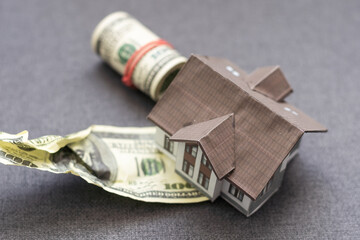 Home with Stacks of Money as Background.