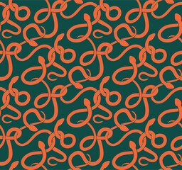 Vector seamless pattern with tangled orange snake silhouettes with on a green background. Fashion fabrics with anacondas.