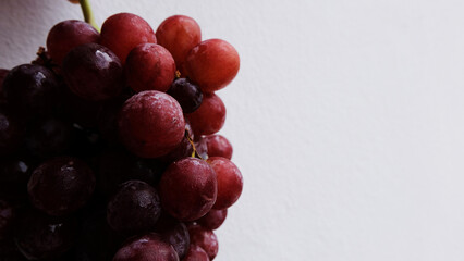  fresh grapes on white background.