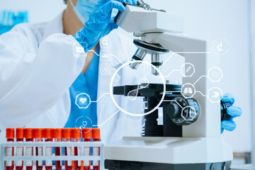DNA molecule testing concepts. The doctor in a mask examines DNA molecules on the chemical...