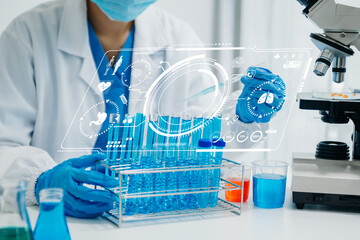 DNA molecule testing concepts. The doctor in a mask examines DNA molecules on the chemical...