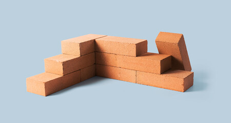 Building brick wall under construction