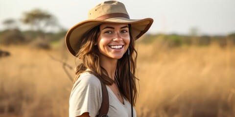 The woman confidently embraces adventure in her outfit and hat, tourist concept