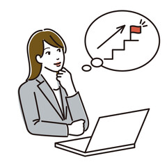 パソコンの前でキャリアについて考える女性ビジネスパーソン
