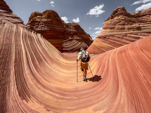 A man hikes into the famous Wave in Arizona